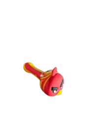 a red and yellow angry bird toy on a black background